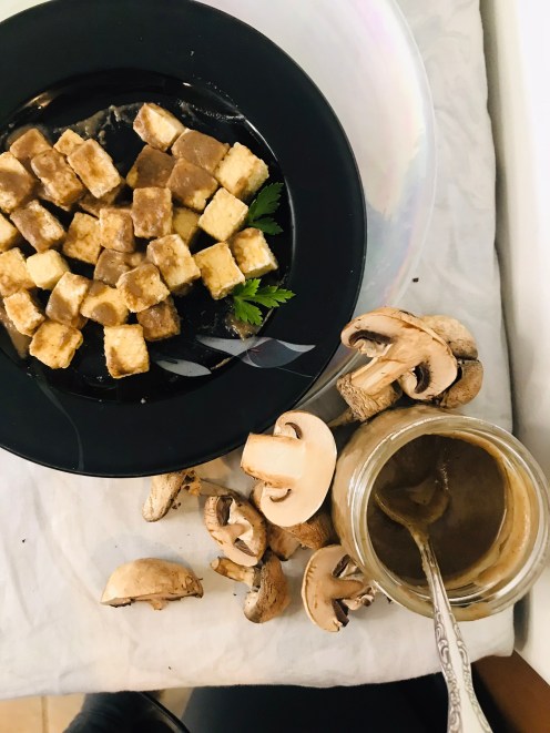 A completed plate of mushroom marinated tofu.